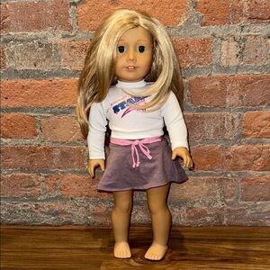American Girl Doll with Blonde Hair blue eyes and gray Skirt